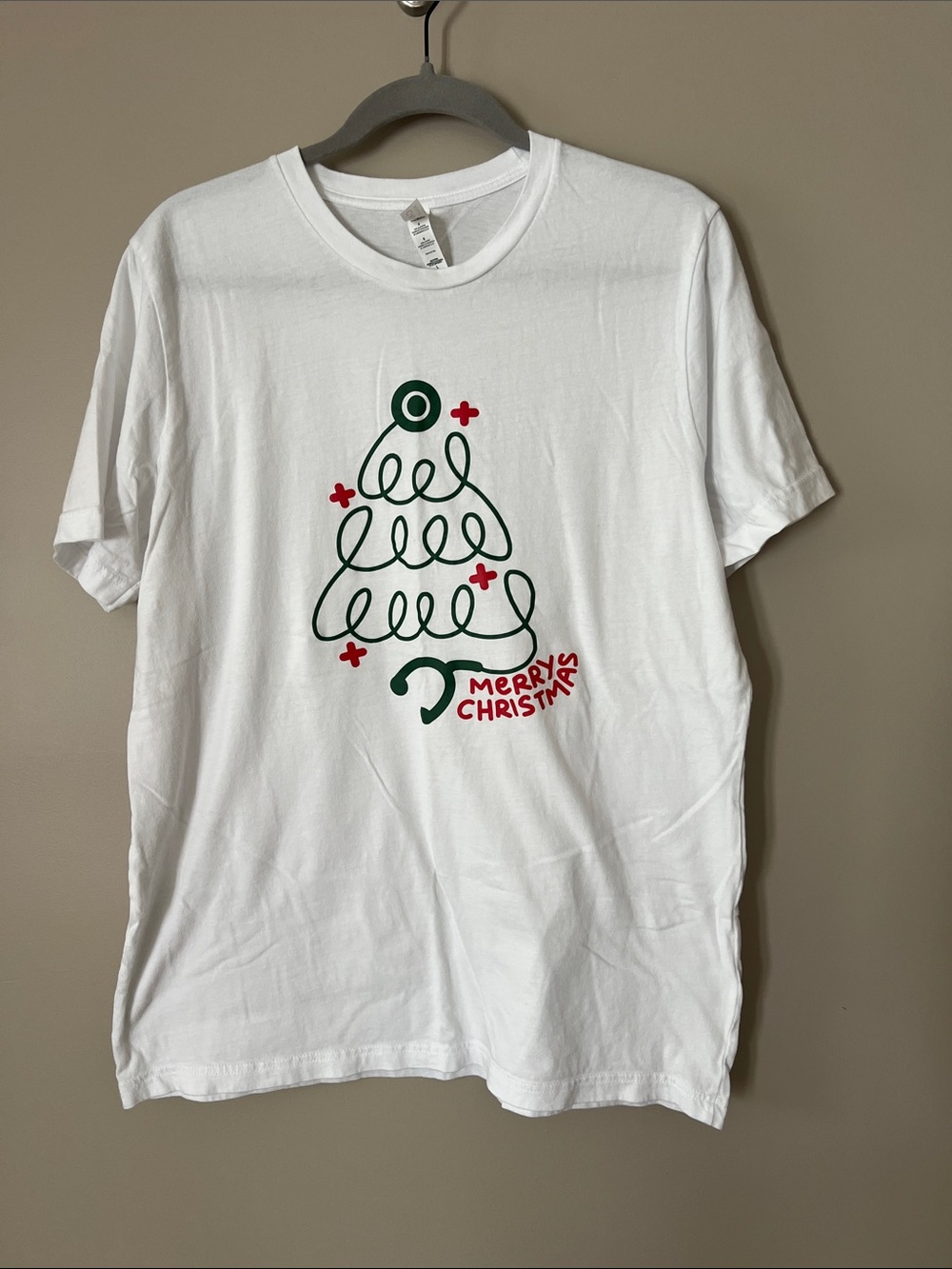 Bella Canvas White Tee with Green & Red Tree Stethoscope graphic